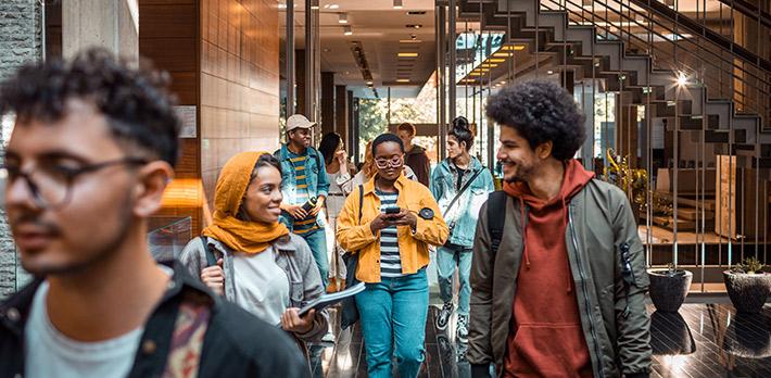 Students on campus leave their class.